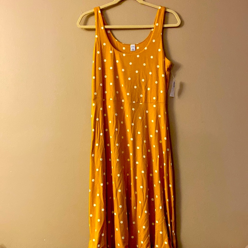 Mustard yellow polka dot dress.